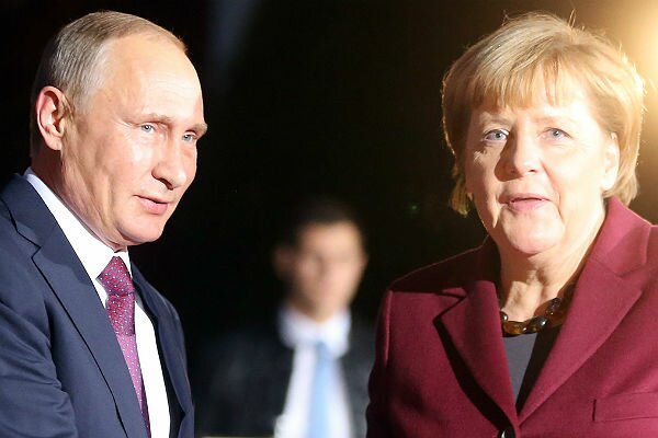 Меркель и Путин побеседовали "на ногах" в театре на G20 – кадры 