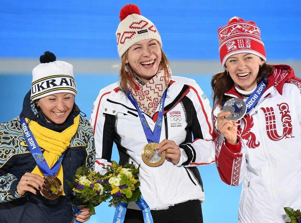 Биатлон золото олимпиады 2014. Вилухина биатлонистка.
